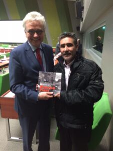 Ulrich Bunjes, special representative of the Council of Europe on Roma Traveller rights receiving his copy of the Pavee Point 30th Anniversary book.